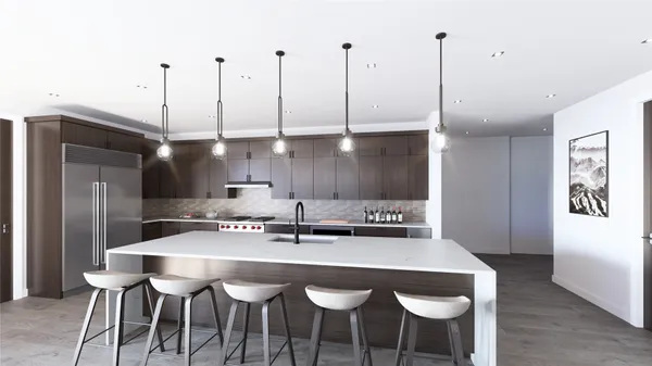 a kitchen with a table and chairs