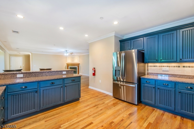 16 Main Street Sparta, NJ 07871 - Photo 6 of 33 a kitchen with stainless steel appliances granite countertop a refrigerator and a sink