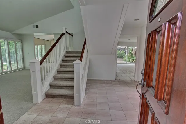 a view of an entryway with staircase