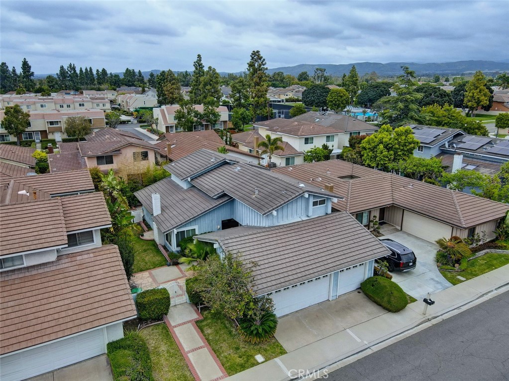 8 Sparrowhawk Irvine, CA 92604 - Photo 3 of 59 a view of a city with lawn chairs and potted plants