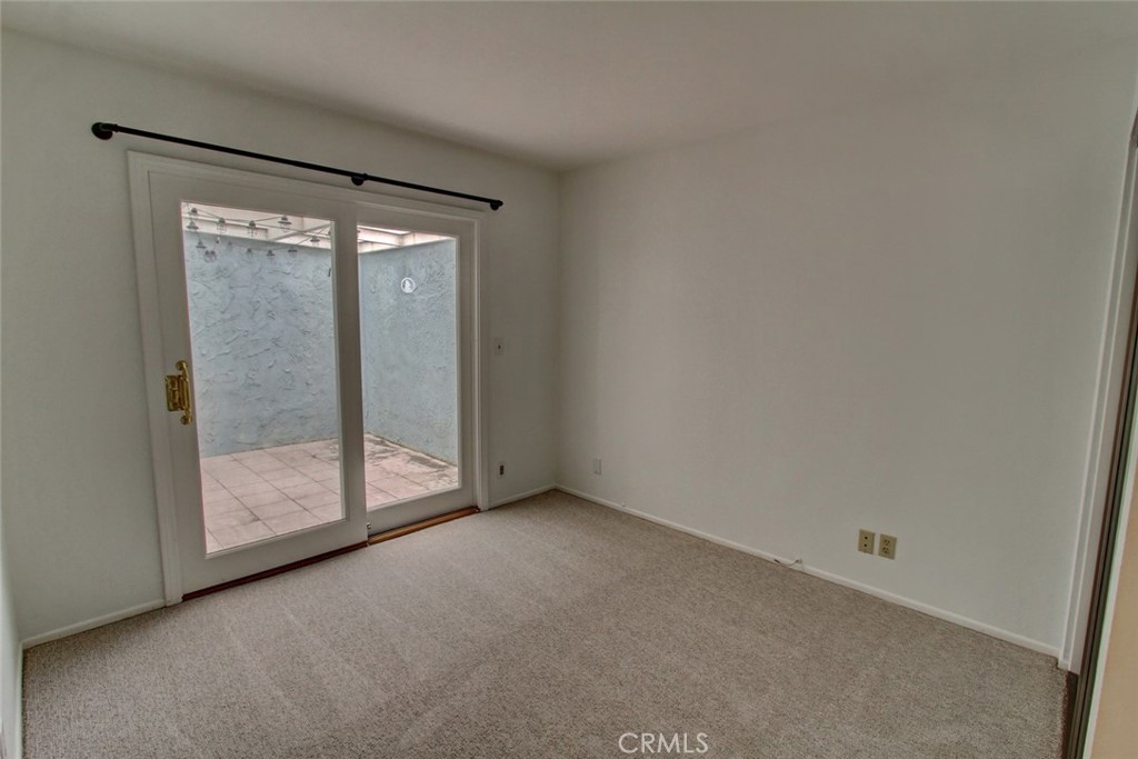 8 Sparrowhawk Irvine, CA 92604 - Photo 37 of 59 a view of an empty room with sliding glass door
