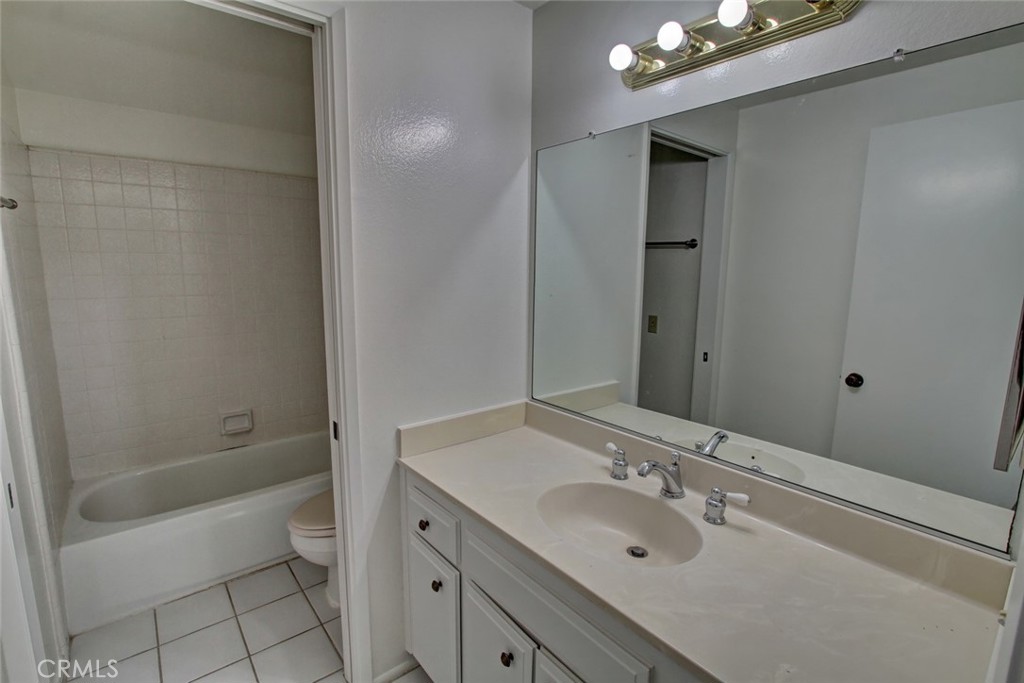 8 Sparrowhawk Irvine, CA 92604 - Photo 48 of 59 a bathroom with a sink a toilet and shower