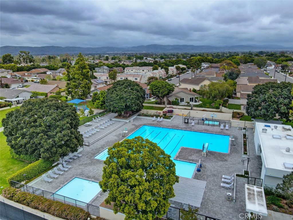 8 Sparrowhawk Irvine, CA 92604 - Photo 54 of 59 an aerial view of a house with a swimming pool