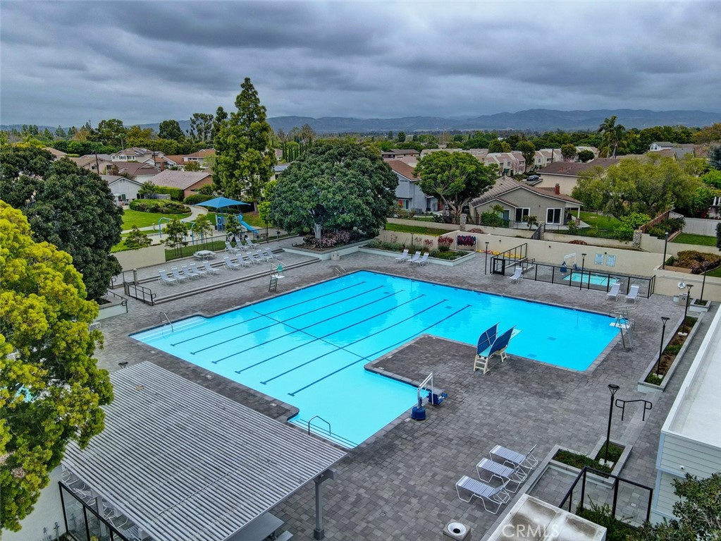 8 Sparrowhawk Irvine, CA 92604 - Photo 56 of 59 an aerial view of a pool patio and mountain view
