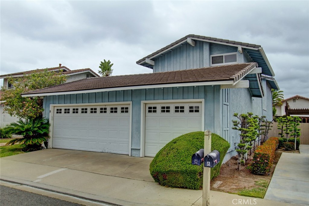 8 Sparrowhawk Irvine, CA 92604 - Photo 7 of 59 a front view of a house with garden