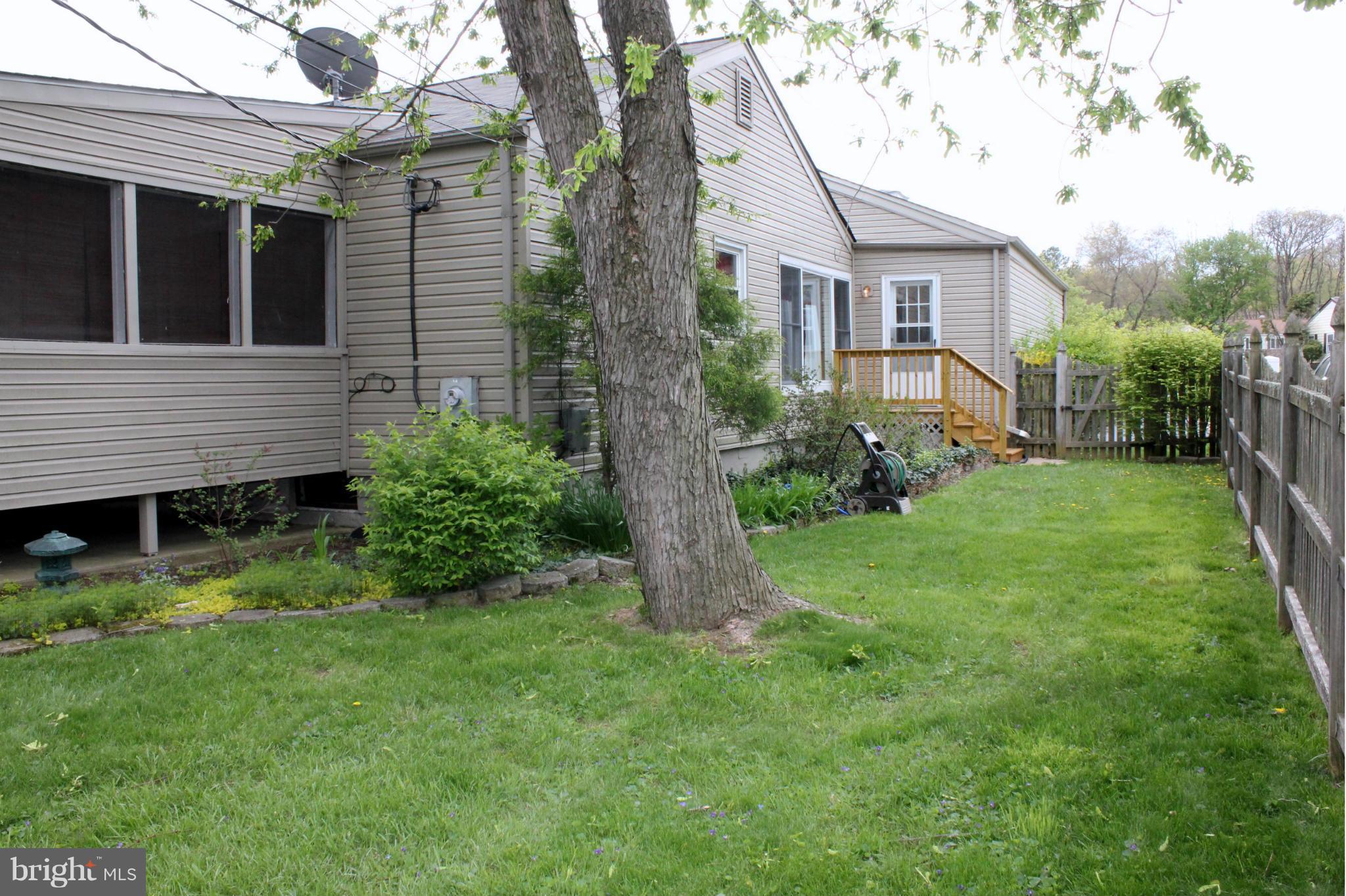 13113 Claxton Drive Laurel, MD 20708 - Photo 25 of 30 Exterior Side Yard w/ New Deck