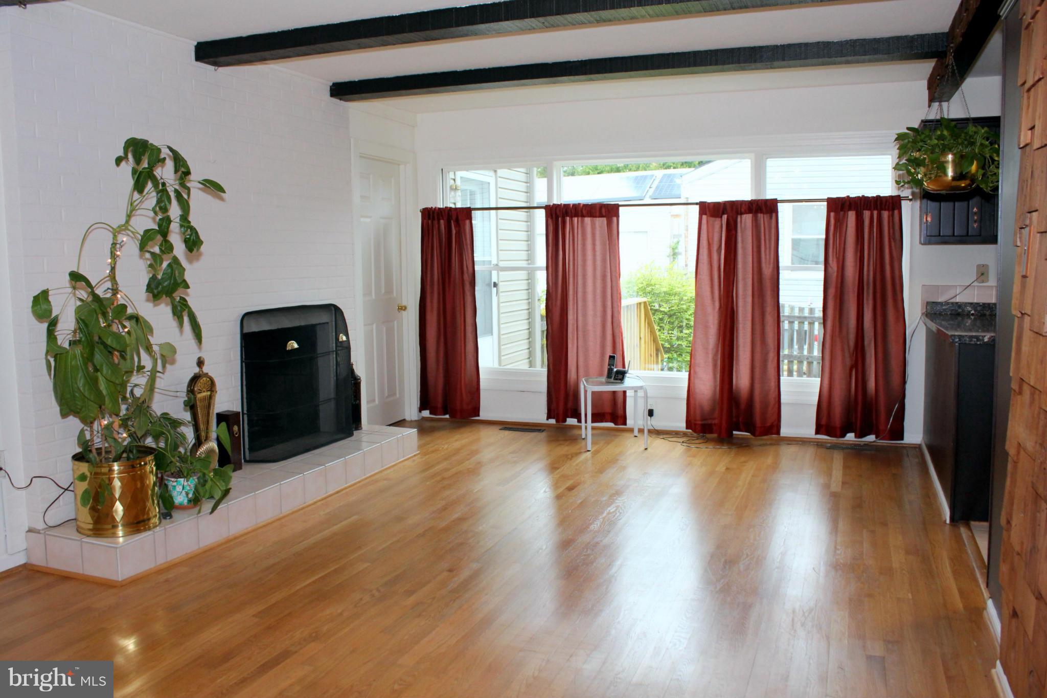 13113 Claxton Drive Laurel, MD 20708 - Photo 7 of 30 Family Room w/ Gas Capped Fireplace