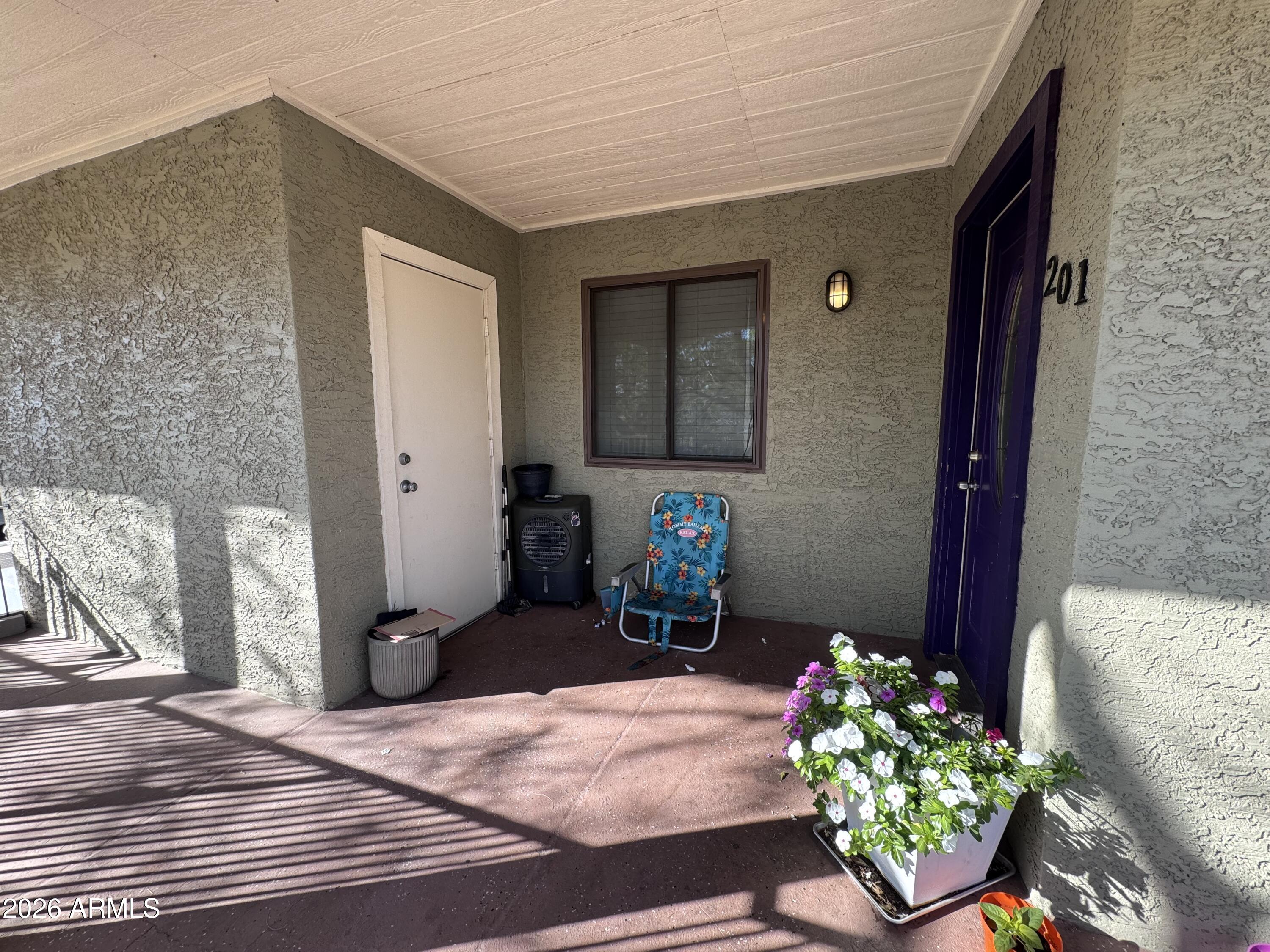 1336 East Mountain View Road, Unit 201 Phoenix, AZ 85020 - Photo 15 of 16 a front view of a house