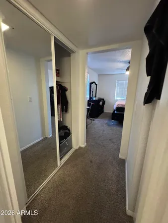 a view of a livingroom walk in closet