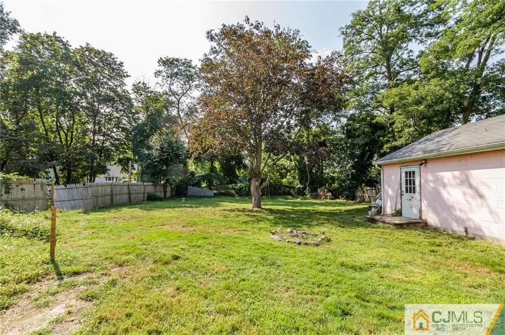294 E Road Middletown, NJ 07718 - Photo 23 of 23 a view of a backyard with basketball court