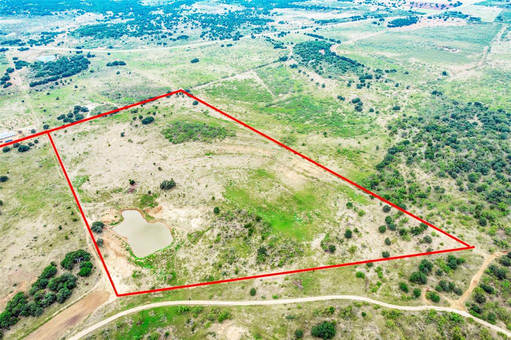 46.86-acres Stewart Ranch Road Loving, TX 76460 - Photo 14 of 16 a view of backyard with wooden floor