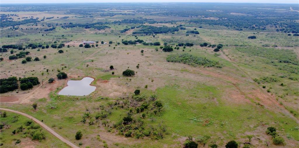 46.86-acres Stewart Ranch Road Loving, TX 76460 - Photo 17 of 17 an aerial view of house with a yard
