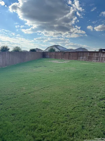 a view of a big yard next to a building