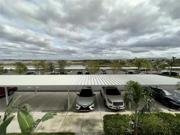 a view of swimming pool with furniture
