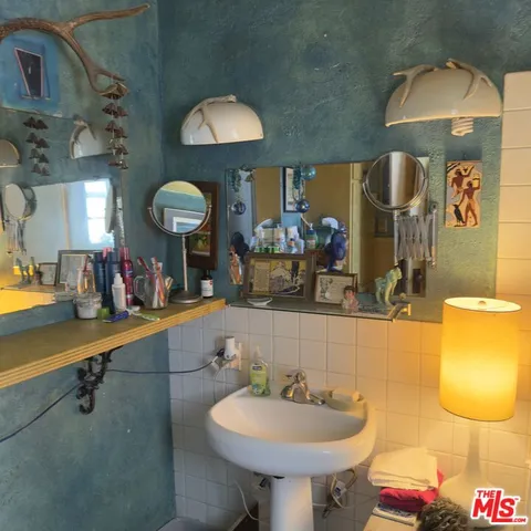 a view of a house with a tree