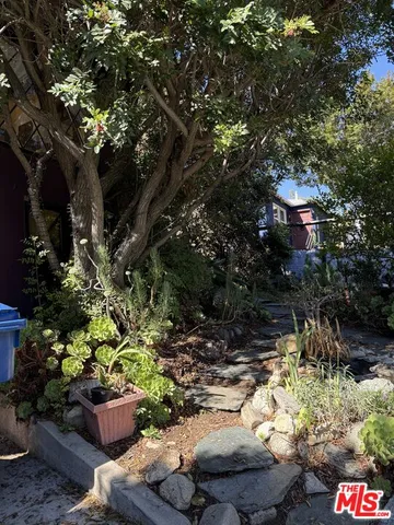 a utility room with view of walk in closet