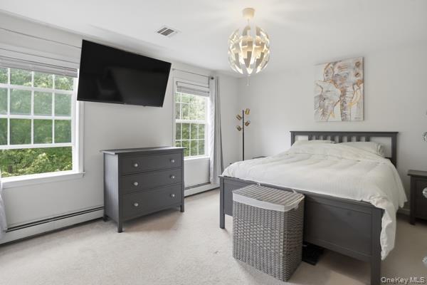 29 Hickory Hill Road Newburgh, NY 12550 - Photo 26 of 47 a bed room with a bed and a television