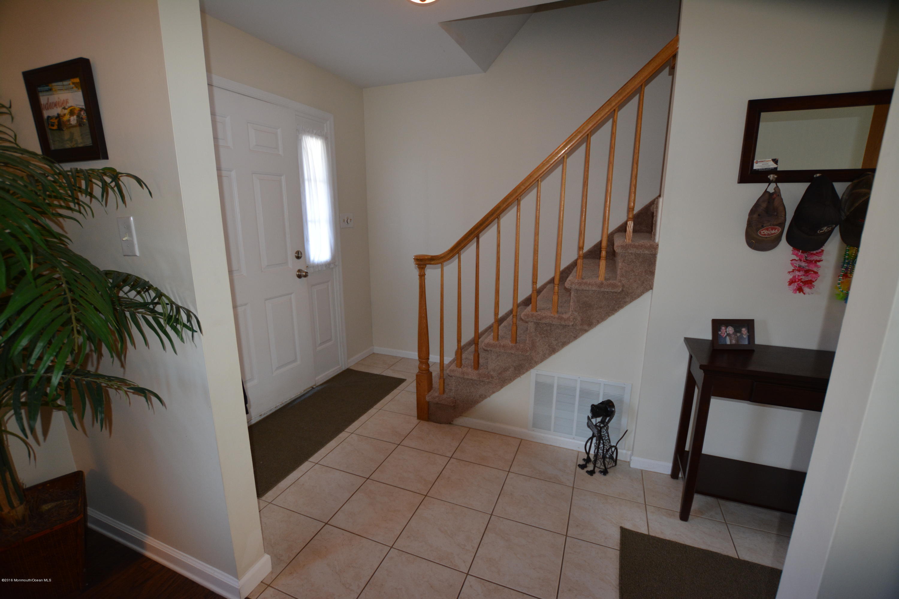 2 Appletree Road Howell, NJ 07731 - Photo 2 of 19 a view of entryway and hall with a potted plant