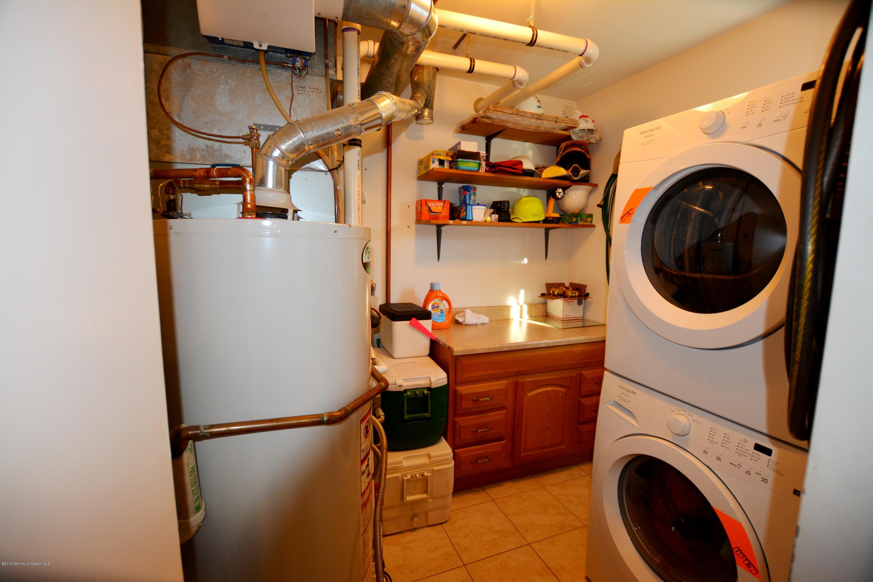 2 Appletree Road Howell, NJ 07731 - Photo 6 of 19 a utility room with dryer and washer