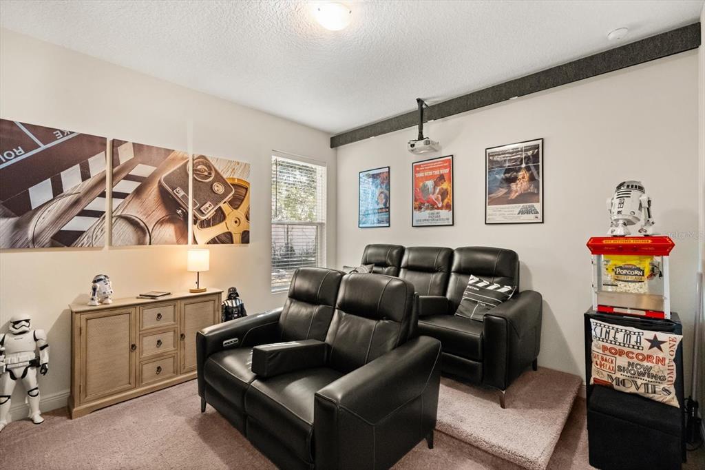 2709 Tree Meadow Loop Apopka, FL 32712 - Photo 19 of 31 a living room with furniture cabinets and window