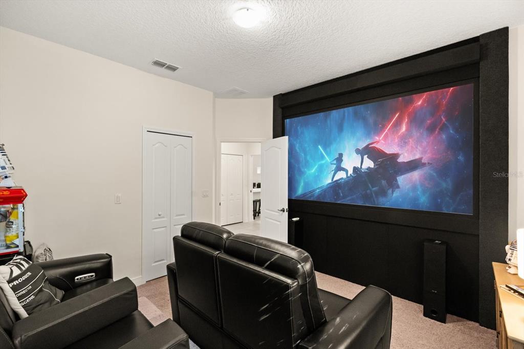 2709 Tree Meadow Loop Apopka, FL 32712 - Photo 20 of 31 a room with furniture and screen