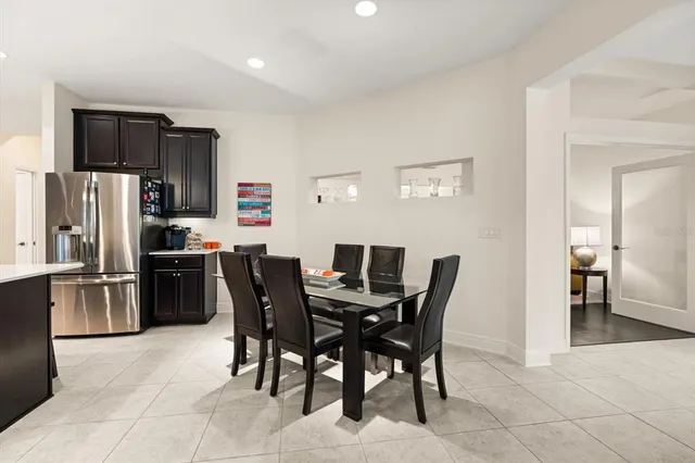 a view of a dining room with furniture