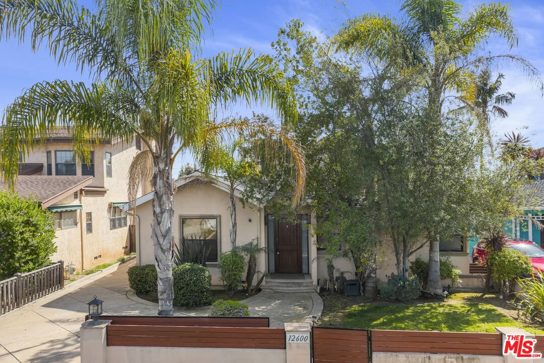 12600 Appleton Way Los Angeles, CA 90066 - Photo 1 of 1 a front view of a house with garden