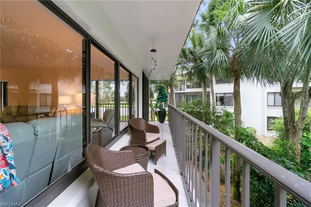 a view of balcony with furniture