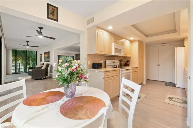 a view of a dining room with furniture