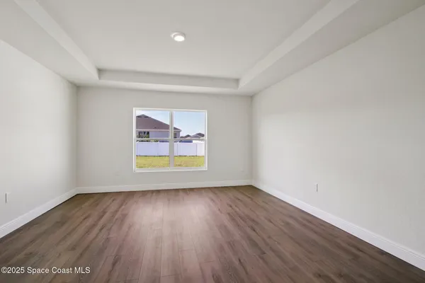 a kitchen with stainless steel appliances a refrigerator and a stove top oven