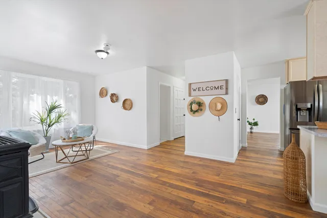 a view of livingroom with furniture and wooden floor