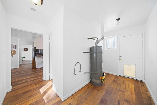 a view of a backyard of the house