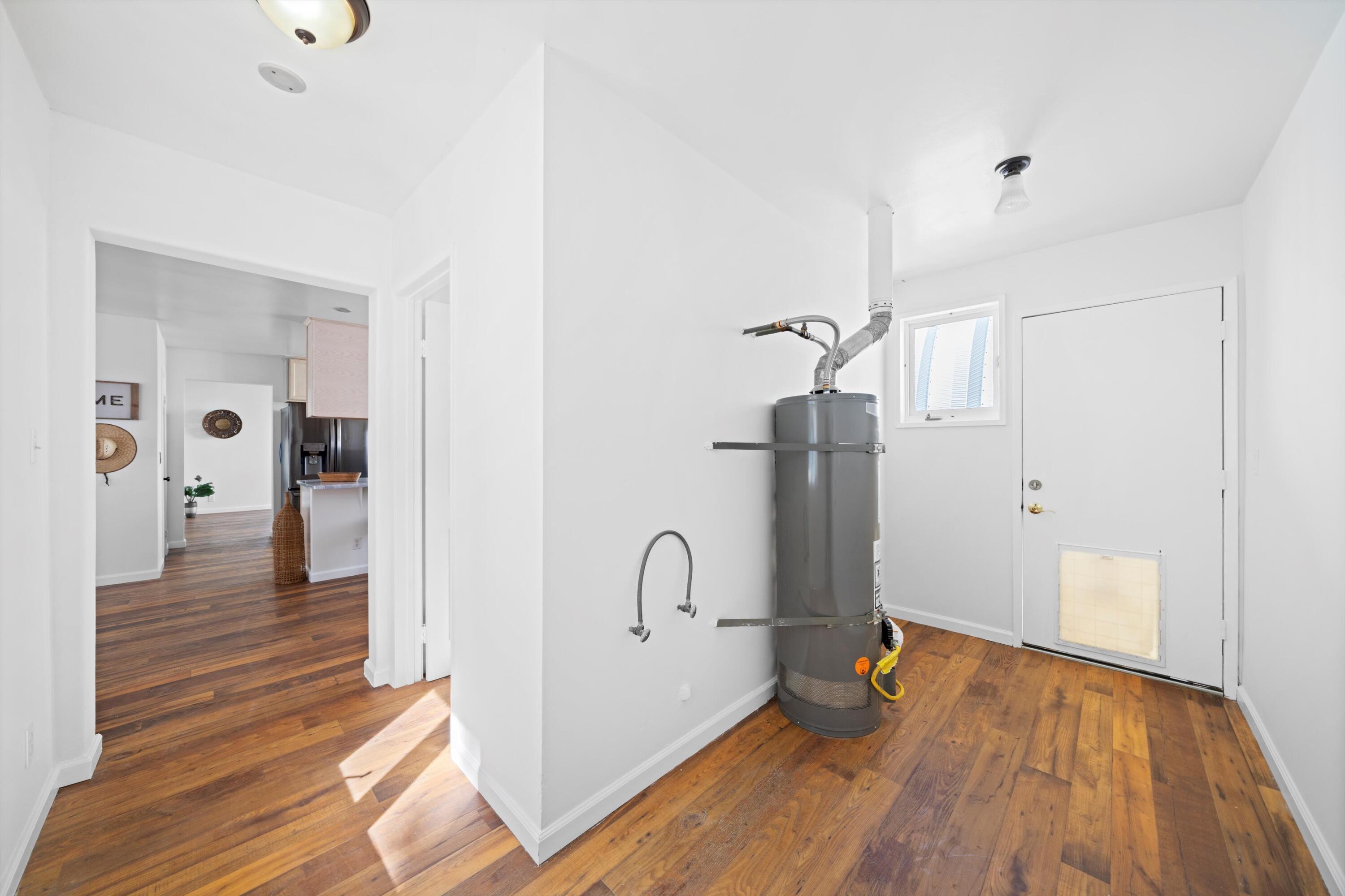 16930 Grindelwald Drive Tehachapi, CA 93561 - Photo 30 of 45 a view of empty room with wooden floor and fan