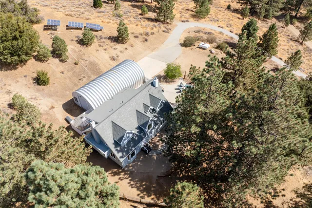 a view of a backyard of a house