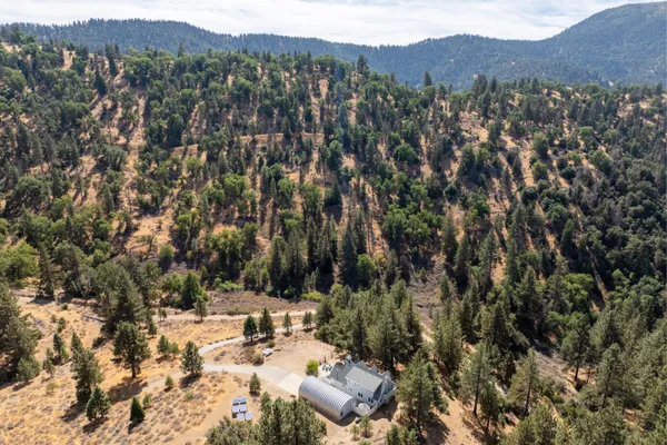 a view of a city with mountains in the background