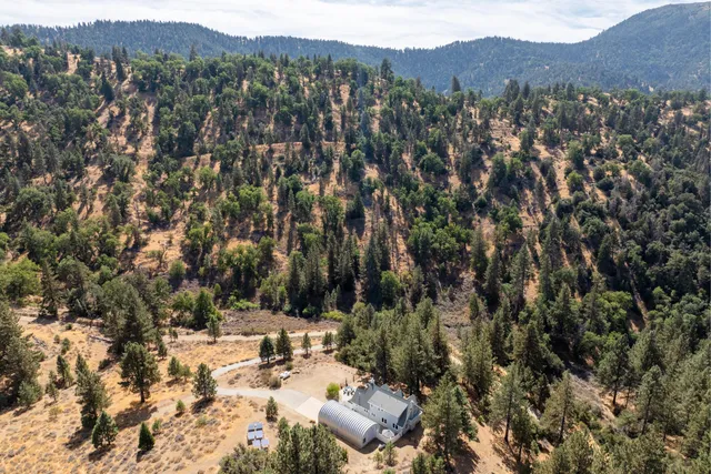 a view of a city with mountains in the background