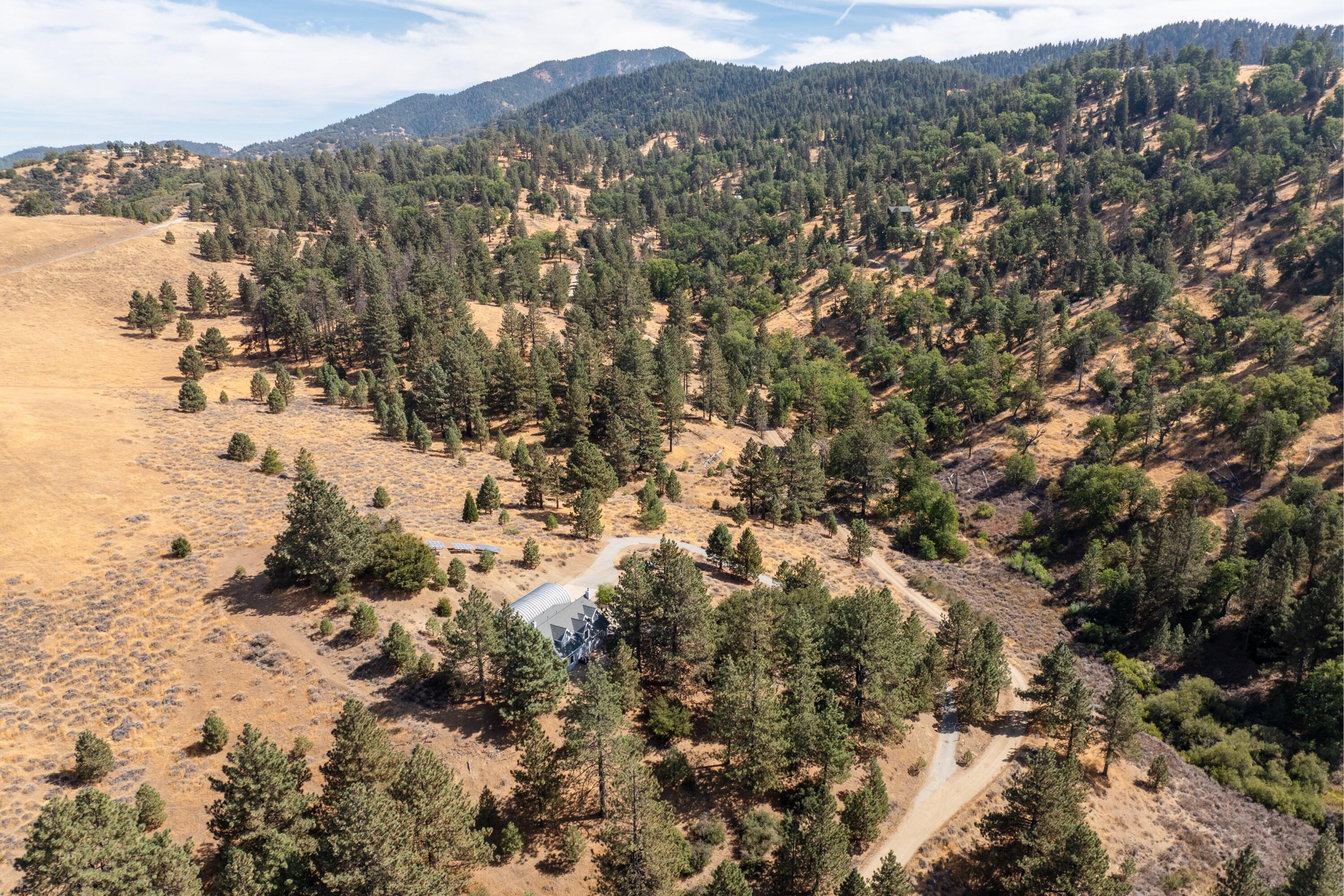 16930 Grindelwald Drive Tehachapi, CA 93561 - Photo 38 of 45 a view of a city with mountains in the background