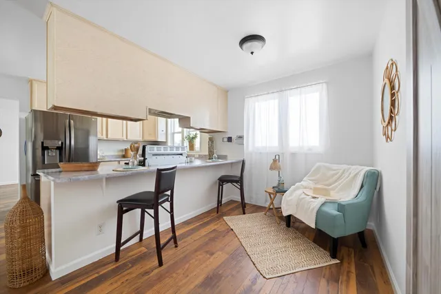 a living room with sink and furniture