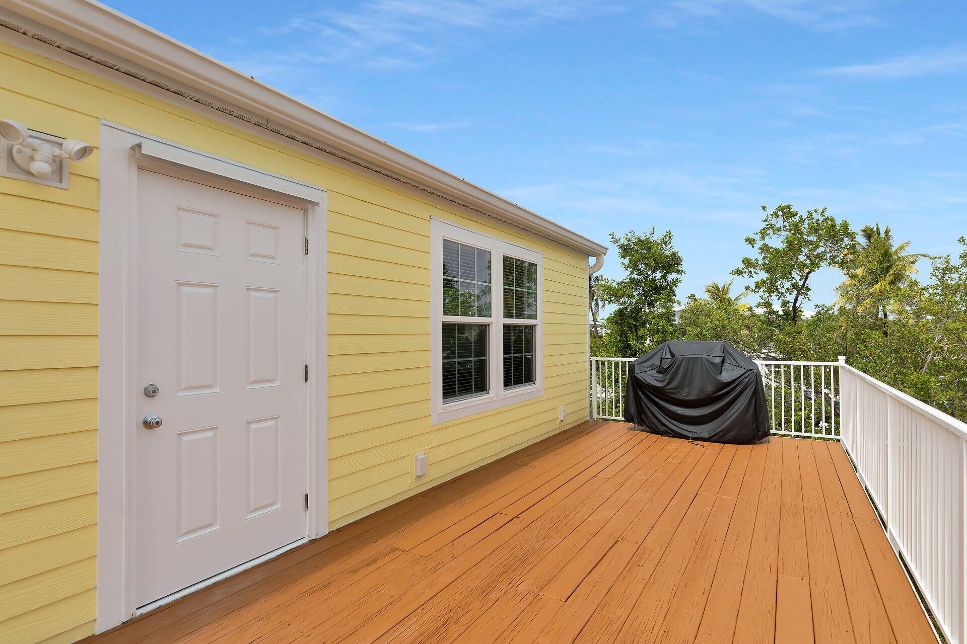 437 Pirates Road Summerland Key, FL 33042 - Photo 12 of 39 a house view with a garden space