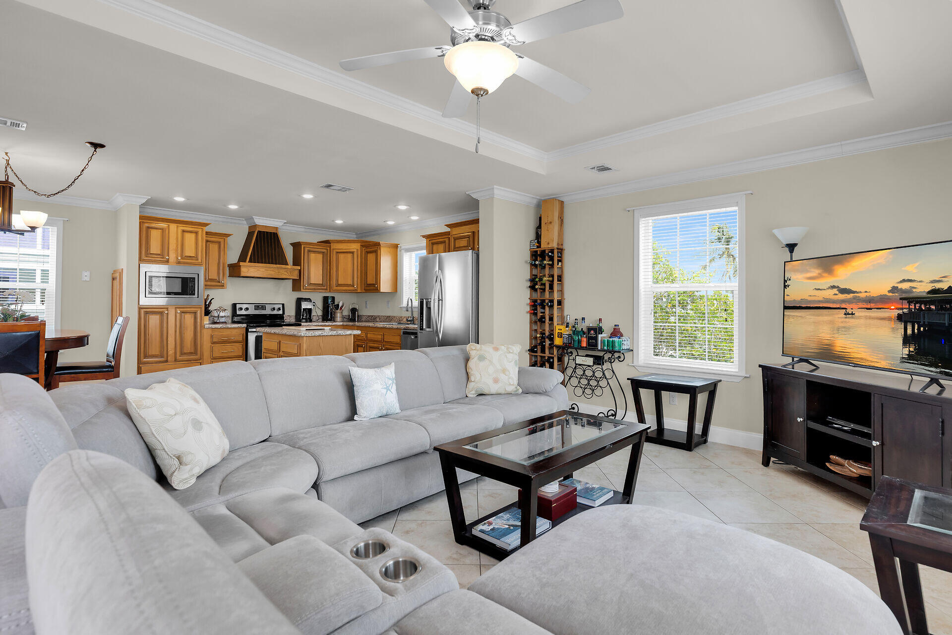437 Pirates Road Summerland Key, FL 33042 - Photo 14 of 39 a living room with furniture a fireplace and a flat screen tv