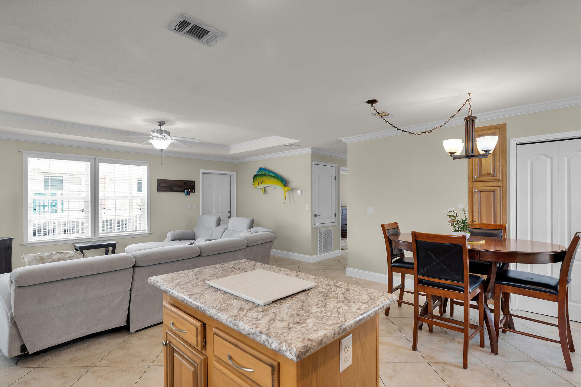 437 Pirates Road Summerland Key, FL 33042 - Photo 16 of 39 a living room with granite countertop furniture and a wooden floor