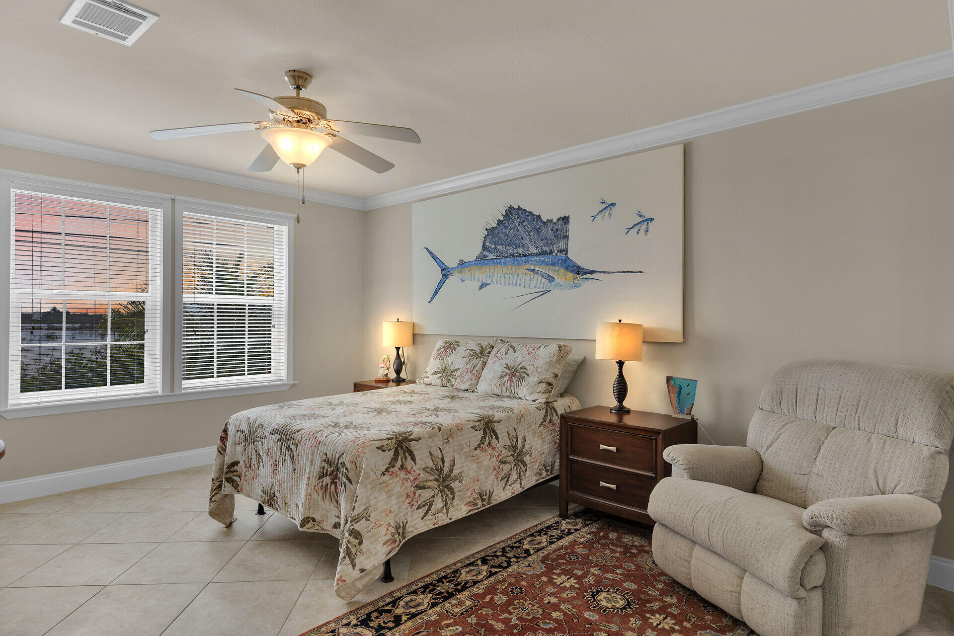 437 Pirates Road Summerland Key, FL 33042 - Photo 22 of 39 a bedroom with a bed and ceiling fan