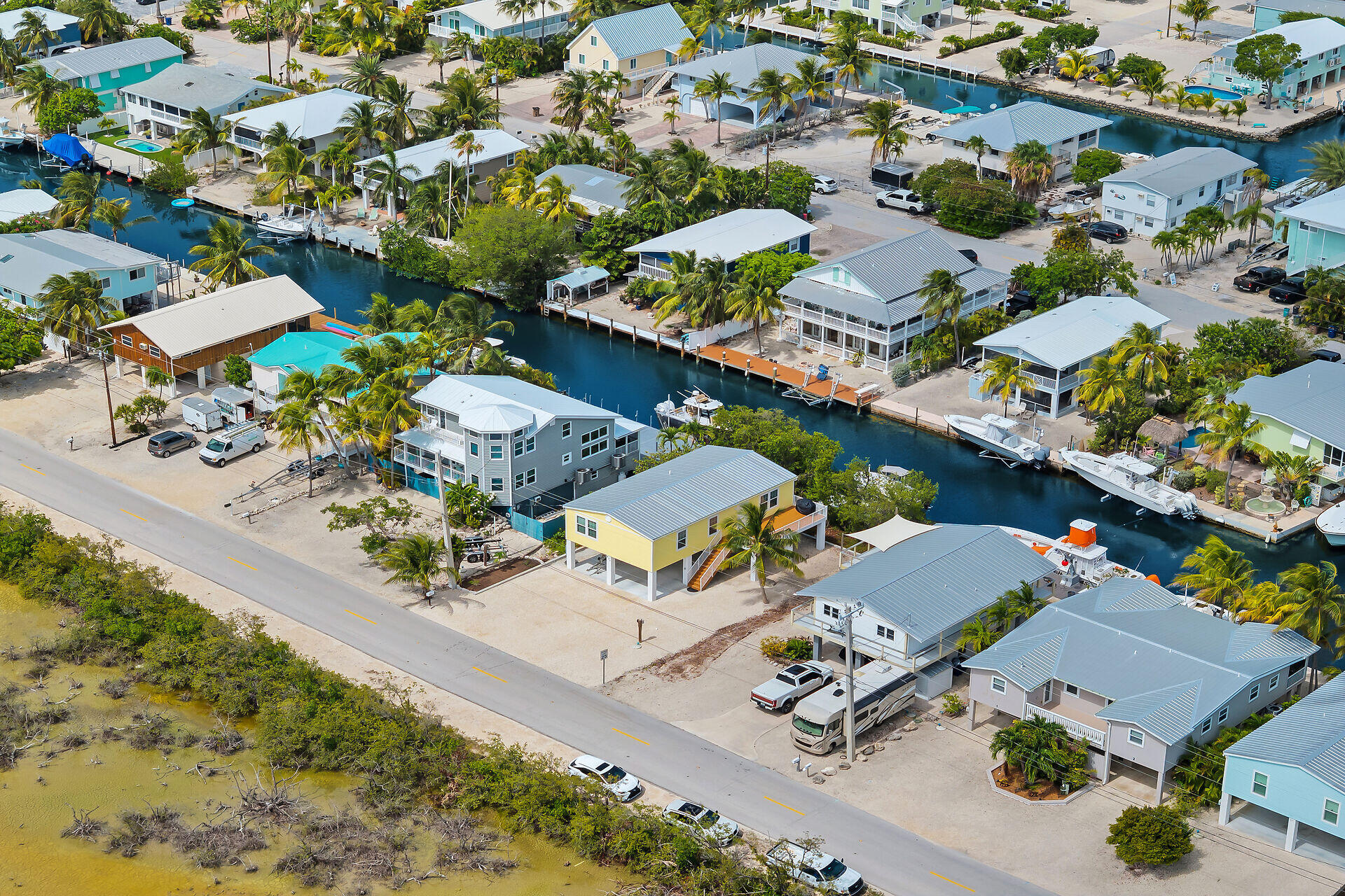 437 Pirates Road Summerland Key, FL 33042 - Photo 35 of 39 an aerial view of a swimming pool with outdoor seating