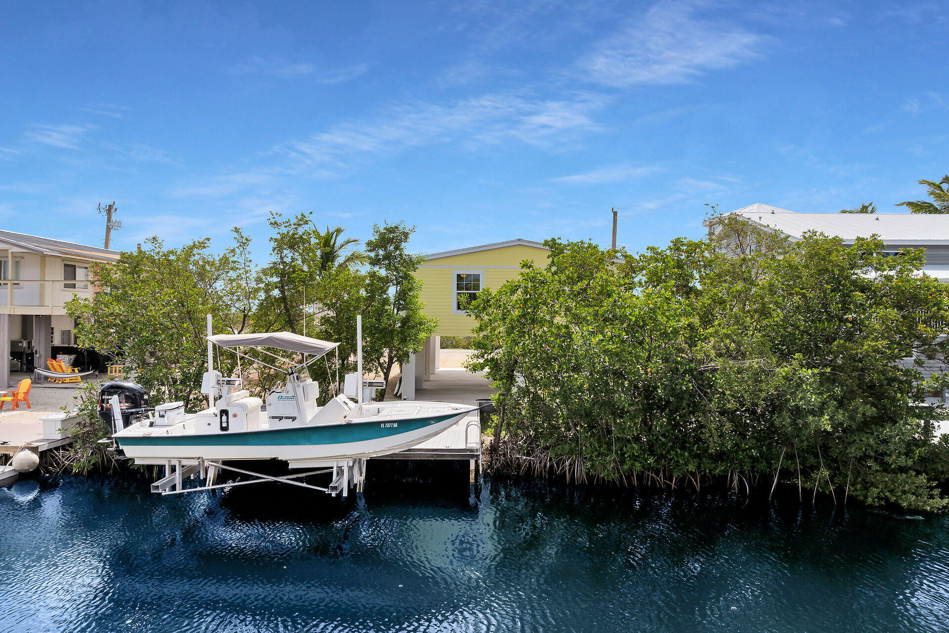 437 Pirates Road Summerland Key, FL 33042 - Photo 8 of 39 a roof deck with table and chairs