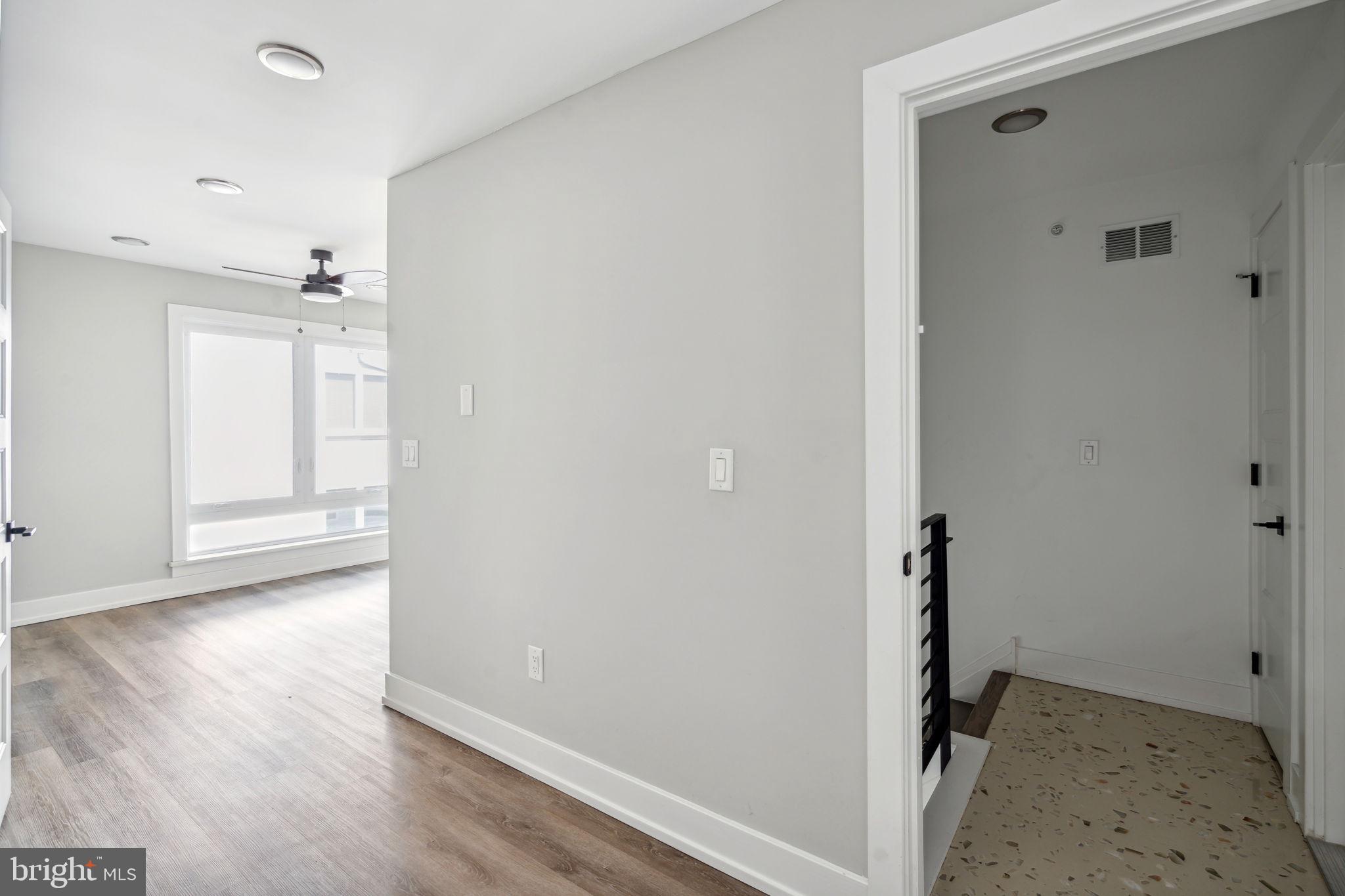 1930 North 2nd Street, Unit 2A Philadelphia, PA 19122 - Photo 17 of 23 a view of a hallway with wooden floor