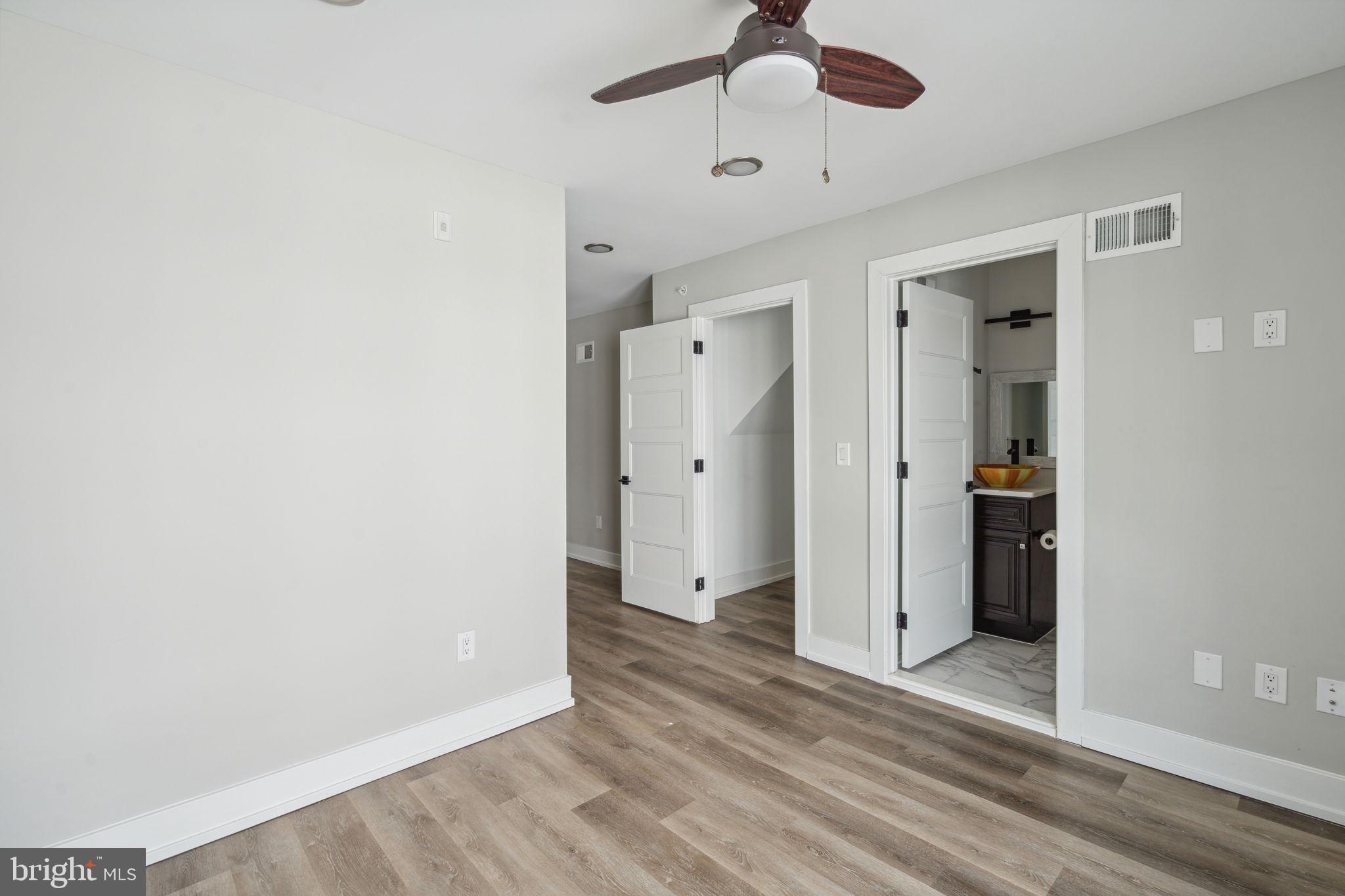 1930 North 2nd Street, Unit 2A Philadelphia, PA 19122 - Photo 19 of 23 wooden floor in an empty room
