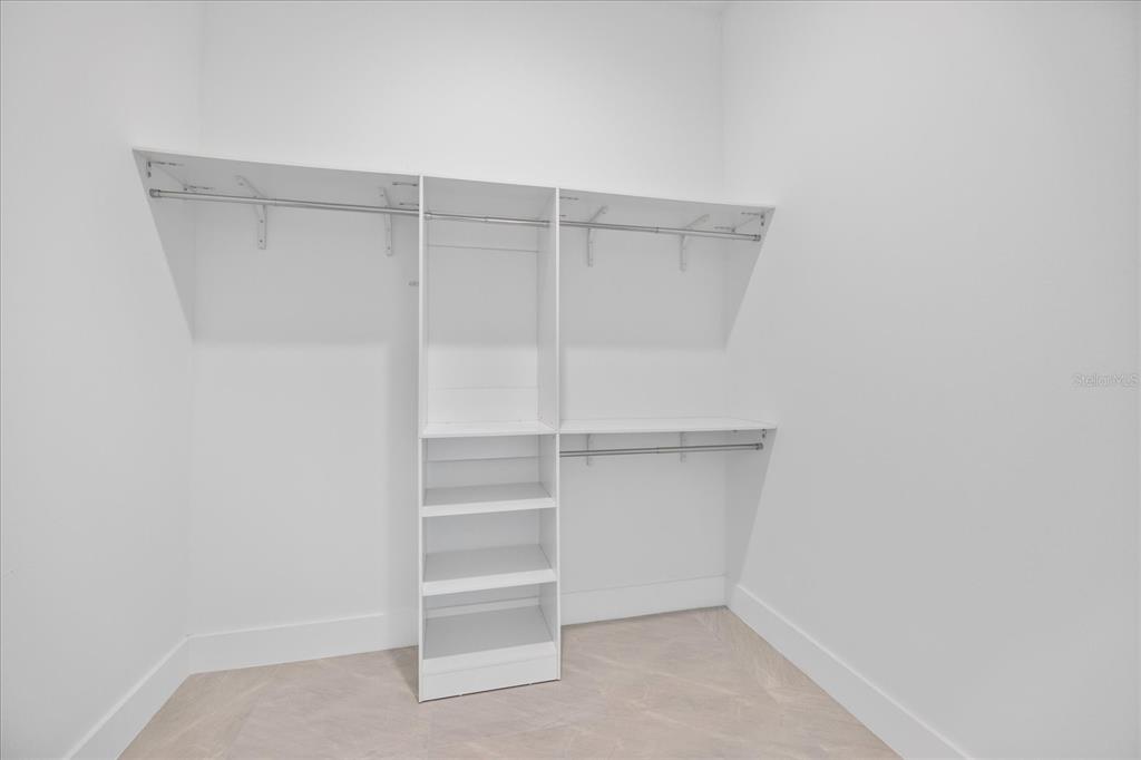 482 Sunset Road North Rotonda West, FL 33947 - Photo 26 of 45 a view of an empty walk in closet