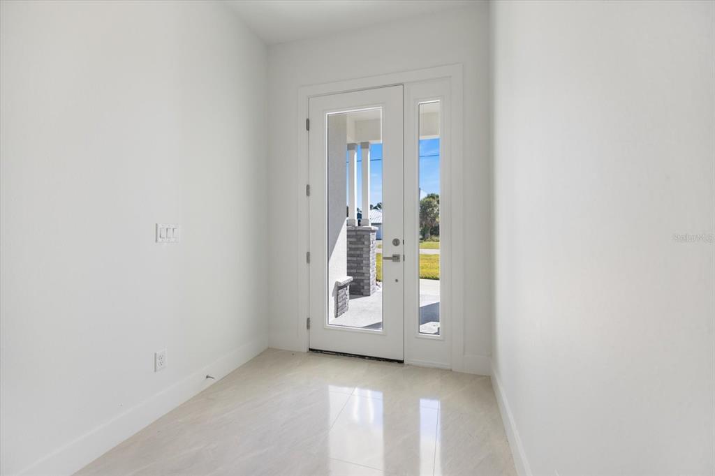 482 Sunset Road North Rotonda West, FL 33947 - Photo 5 of 45 a view of an front door