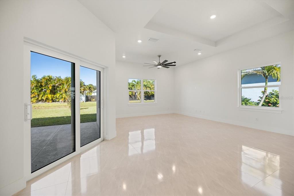 482 Sunset Road North Rotonda West, FL 33947 - Photo 10 of 45 a view of an entryway with a floor to ceiling window