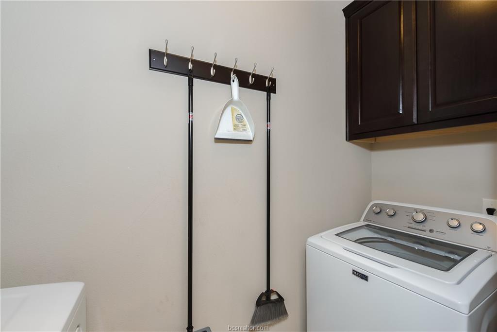 1408 Cres Ridge Drive College Station, TX 77845 - Photo 16 of 19 a utility room with dryer and washer